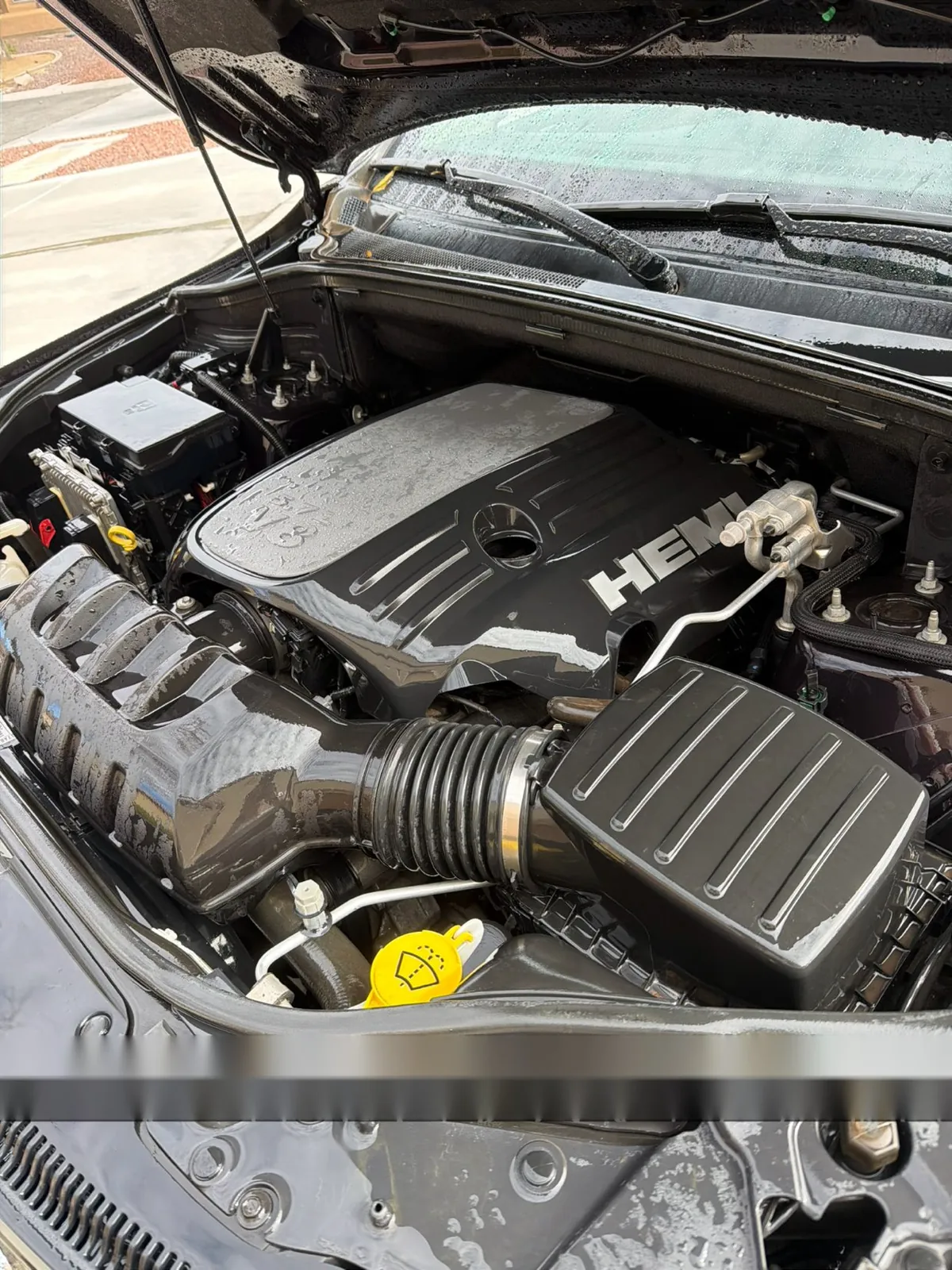 A clean Jeep engine bay after a PMV Detailing engine bay detail